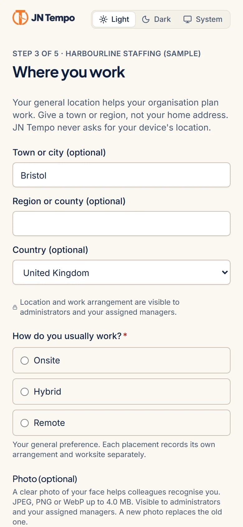Onboarding step on a phone asking for a general work location and work arrangement, with sample answers.